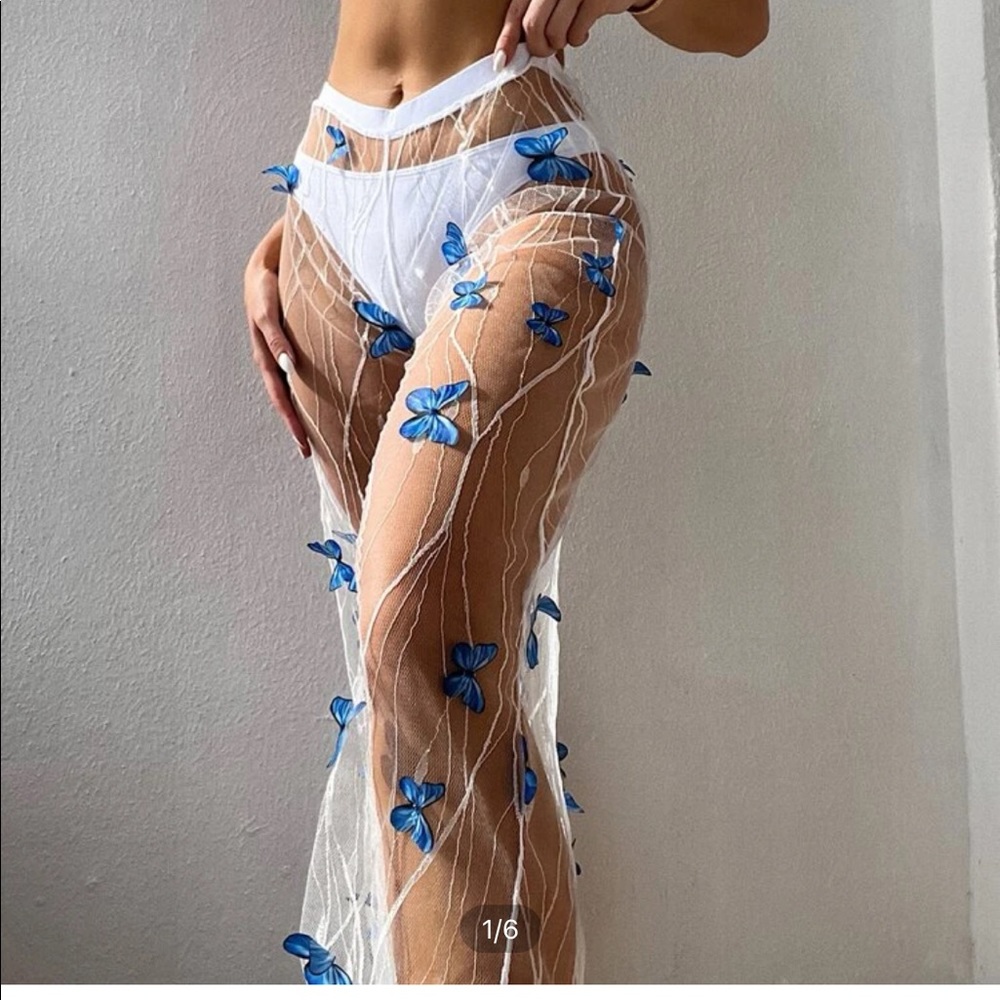 White bikini set with butterfly bottom cover up
